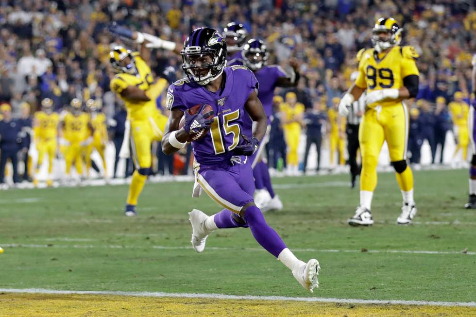 Baltimore Ravens wide receiver Marquise Brown scores against the Los Angeles Rams during the fi ...