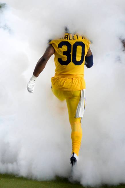 Los Angeles Rams running back Todd Gurley runs on to the field for an NFL football game against ...