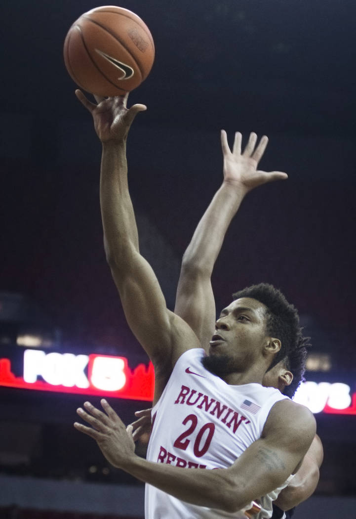 UNLV Rebels forward Nick Blair (20) shoots over Jackson State Tigers guard Venjie Wallis (0) in ...