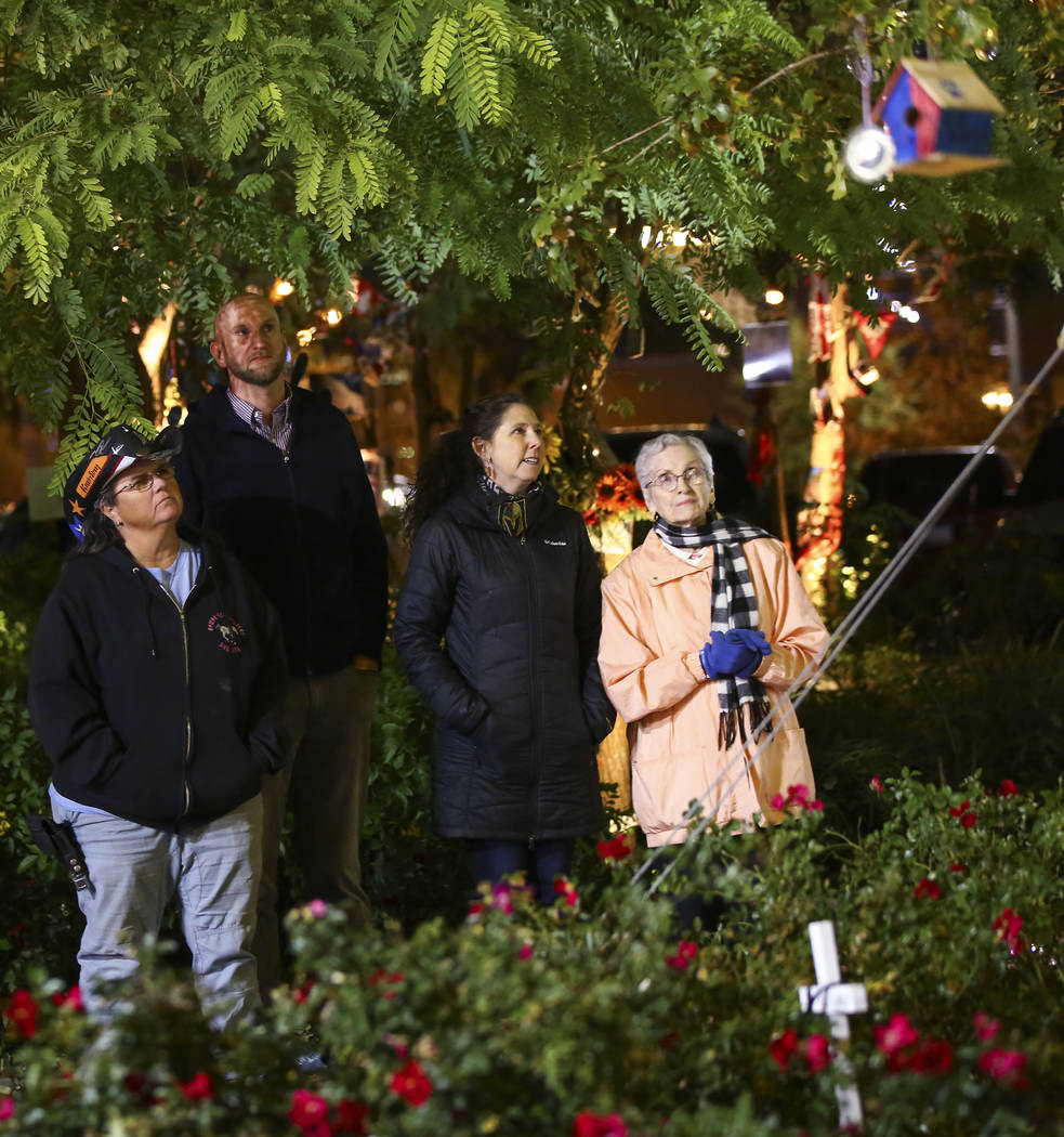 Oct. 1 survivor Sue Ann Cornwell, from left, Aaron Leifheit, program director for the nonprofit ...