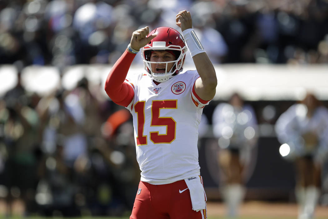 Kansas City Chiefs quarterback Patrick Mahomes (15) yells before a play during the first half o ...