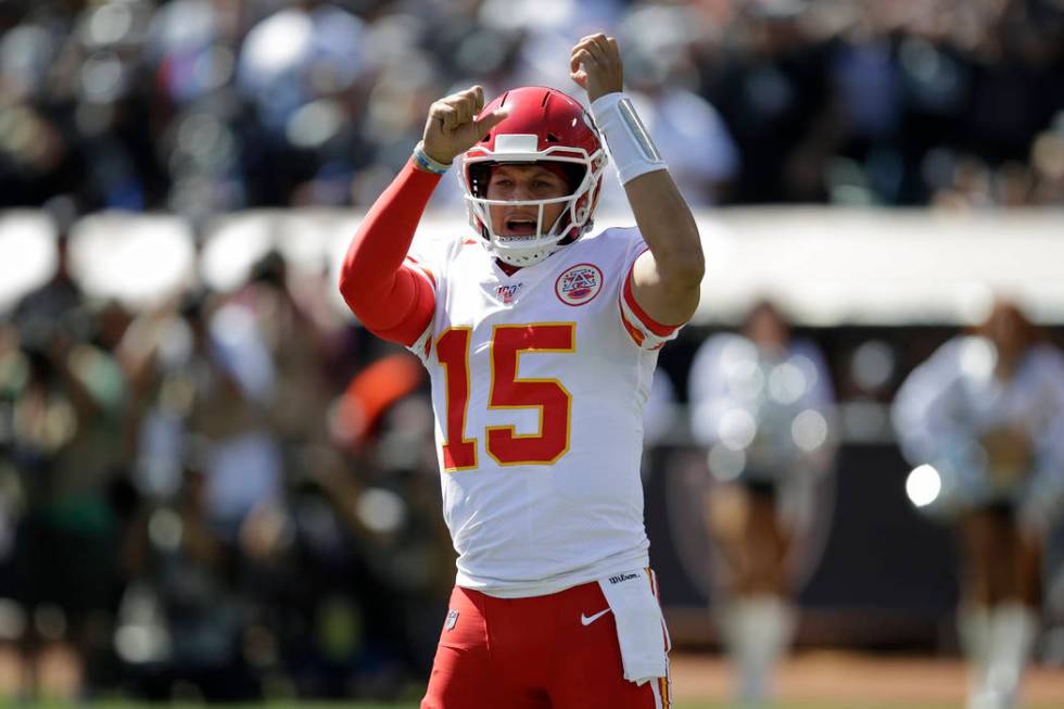 Kansas City Chiefs quarterback Patrick Mahomes (15) yells before a play during the first half o ...