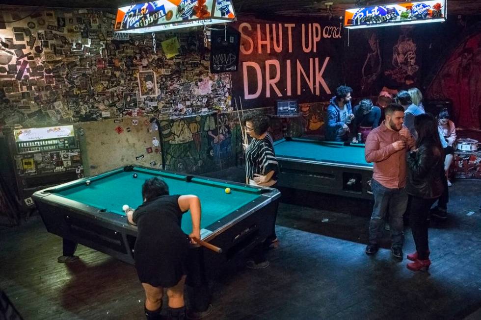 Bar goers play pool at Double Down Saloon on Saturday, Nov. 19, 2017, in Las Vegas. Benjamin Ha ...