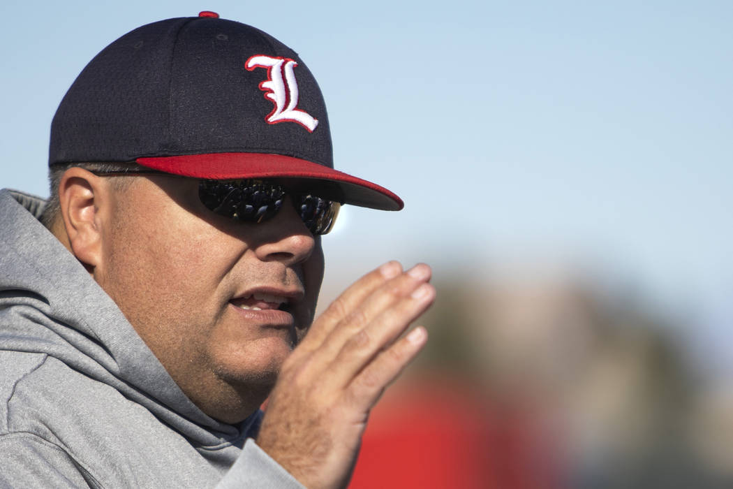 Liberty High School head coach Rich Muraco wraps up practice with a team huddle on Tuesday, Nov ...