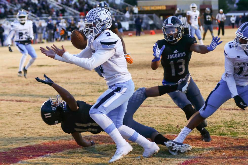 Centennial's Nate Conger (9) intercepts the ball in front of Desert Pines' Jett Solomon (11) du ...