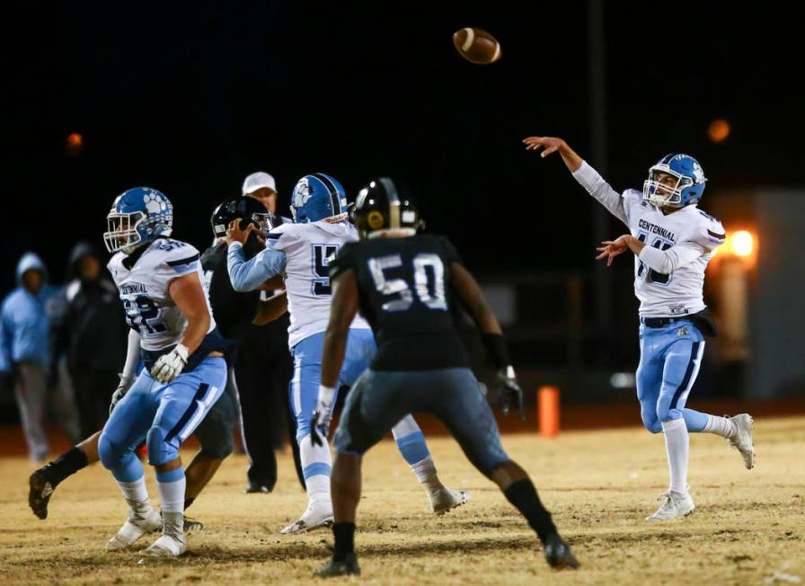 Centennial's Colton Tenney (10) throws a pass during the first half of a Class 4A football stat ...