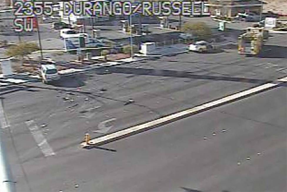 Las Vegas police investigate a fatal crash at South Durango Drive and West Russell Road in the ...