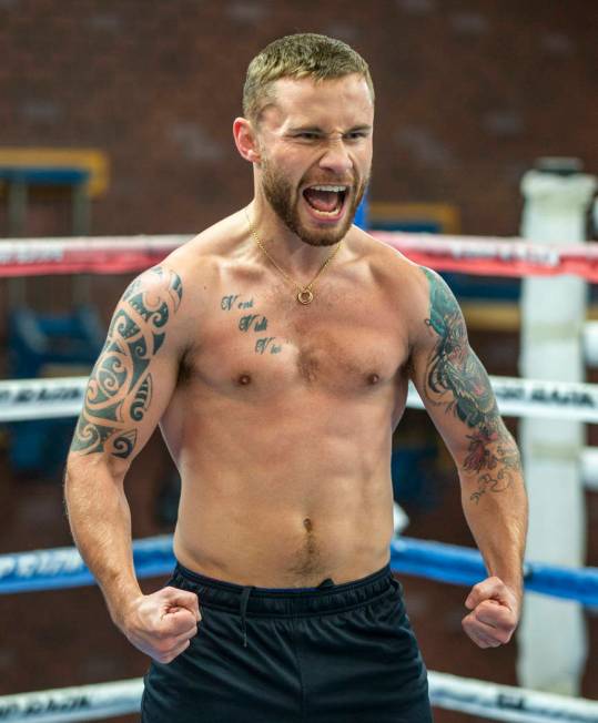 Former two-weight world boxing champion Carl Frampton is pumped up during a training at the Top ...