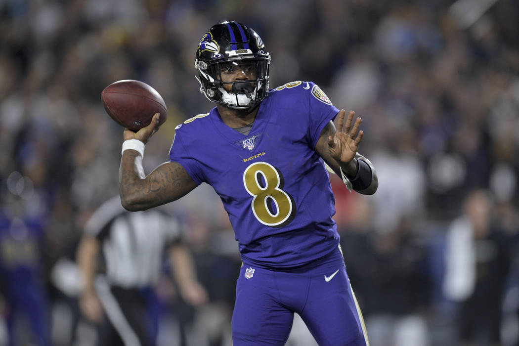 Baltimore Ravens quarterback Lamar Jackson in an NFL football game against the Los Angeles Rams ...