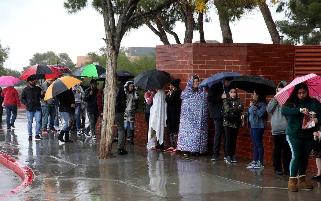 People line up to enter JCPenny at Meadows Mall in Las Vegas for early Black Friday deals on Th ...