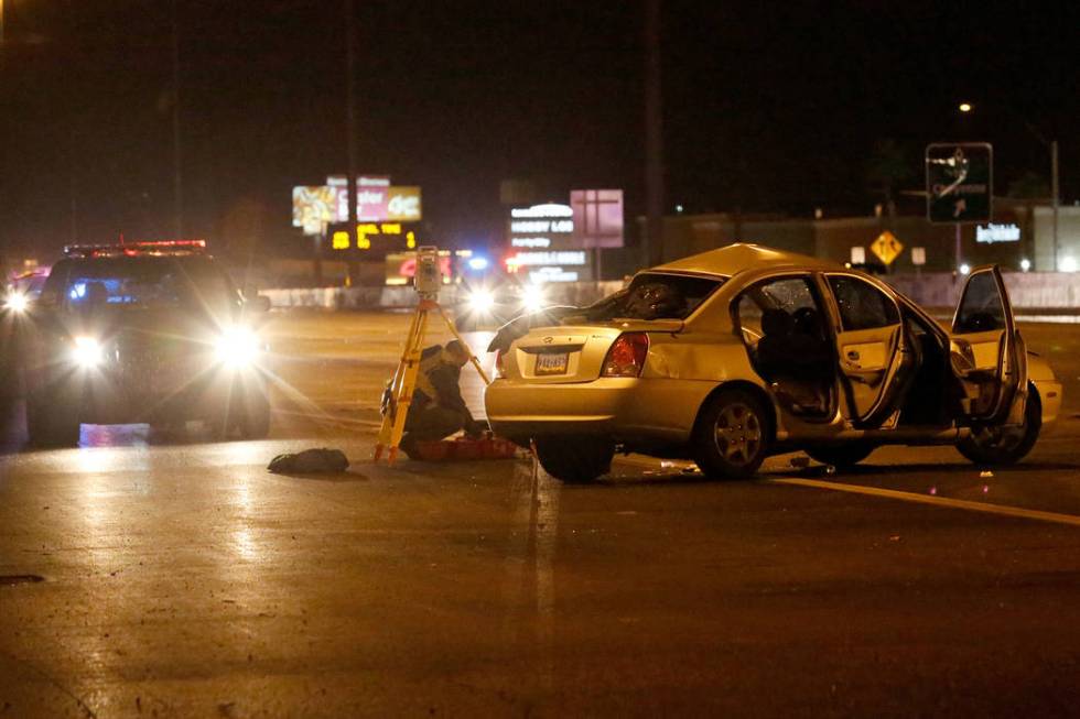 Police investigate a fatal crash on U.S. Highway 95 near Lake Mead Boulevard, Thursday, Nov. 28 ...