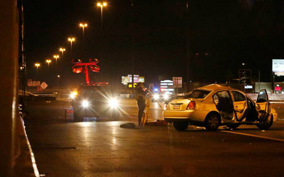 Police investigate a fatal crash on U.S. Highway 95 near Lake Mead Boulevard, Thursday, Nov. 28 ...