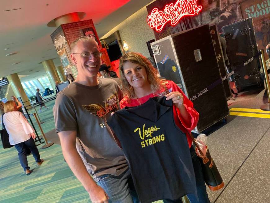 Kris and Barbie Dahl are shown with Steven Tyler's famous Vegas Strong T-shirt at Park Theater ...