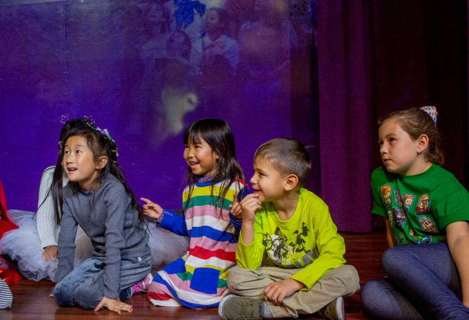 Children smile during a dance class taught by the Nevada Ballet Theatre during the Discovery Ch ...