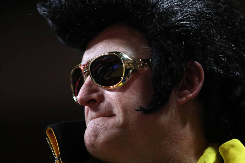 Greg Suckow of Eagan, Minnesota dresses as Elvis for the University of Iowa versus San Diego St ...