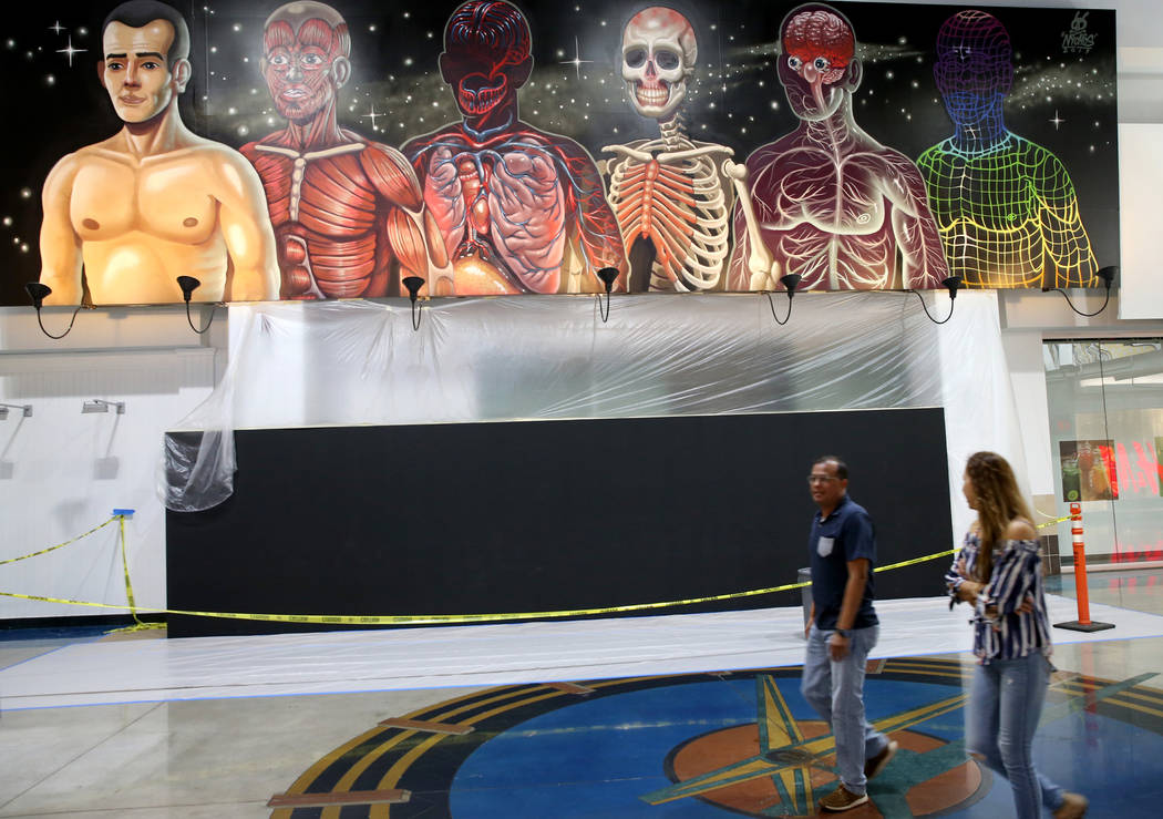 Murals in progress at Fashion Outlets of Las Vegas in Primm as the outlet mall is rebranded to ...