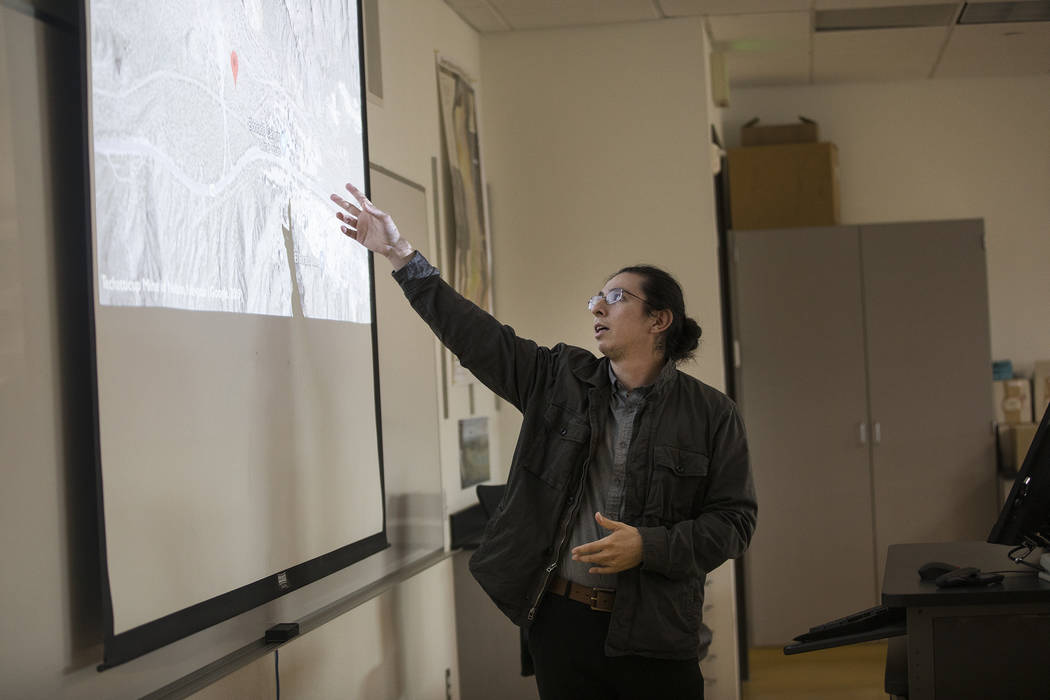 Juan Garcia-Hernandez delivers a presentation in an environmental management class at the Colle ...