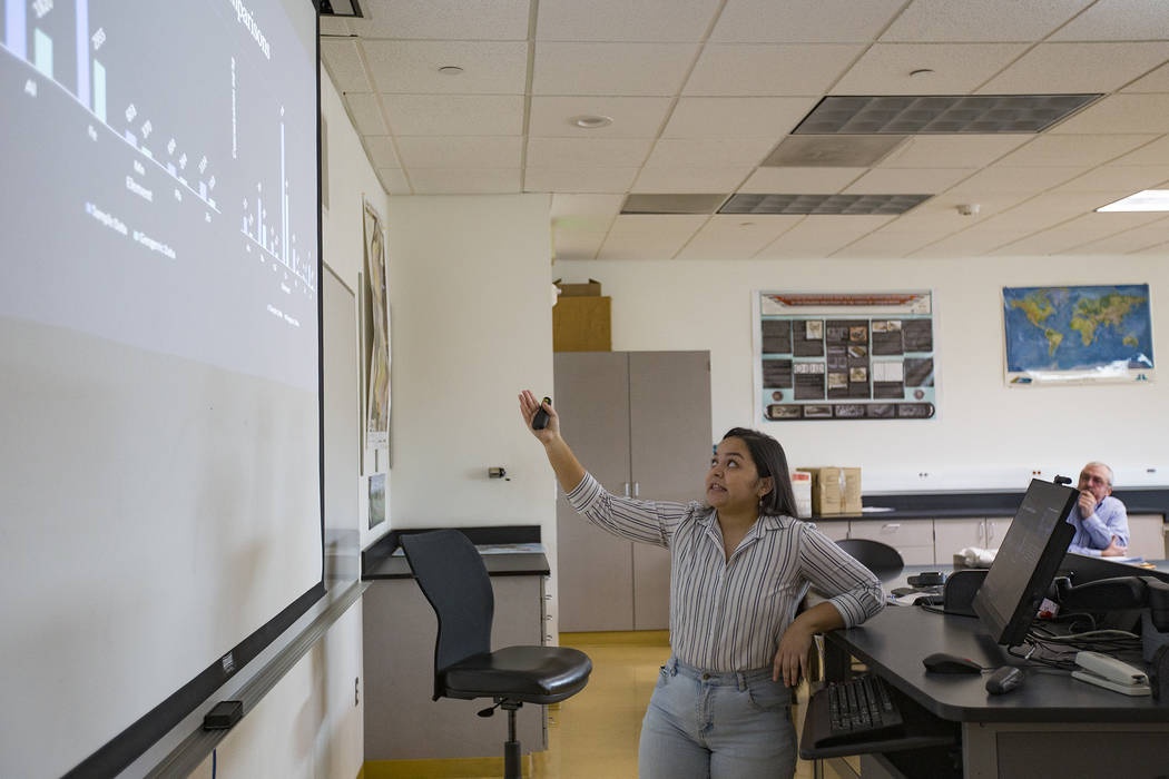 Giavanna Fernandez delivers a presentation in an environmental management class at the College ...