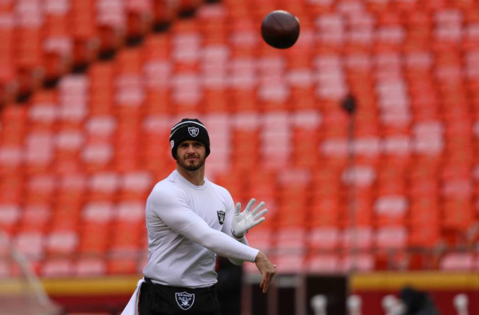 Oakland Raiders quarterback Derek Carr throws the football during pregame warm ups prior to an ...