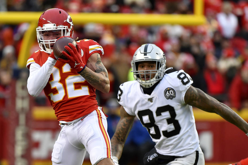 Kansas City Chiefs safety Tyrann Mathieu (32) intercepts a pass intended for Oakland Raiders ti ...