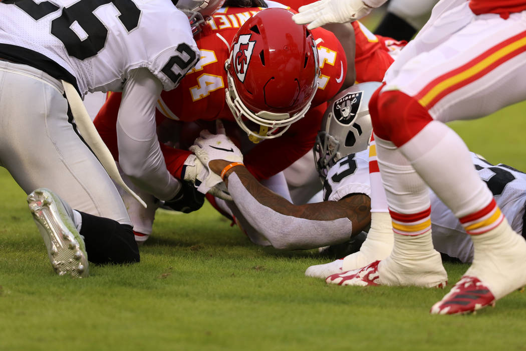 Kansas City Chiefs linebacker Dorian O'Daniel (44) recovers a fumble as Oakland Raiders running ...