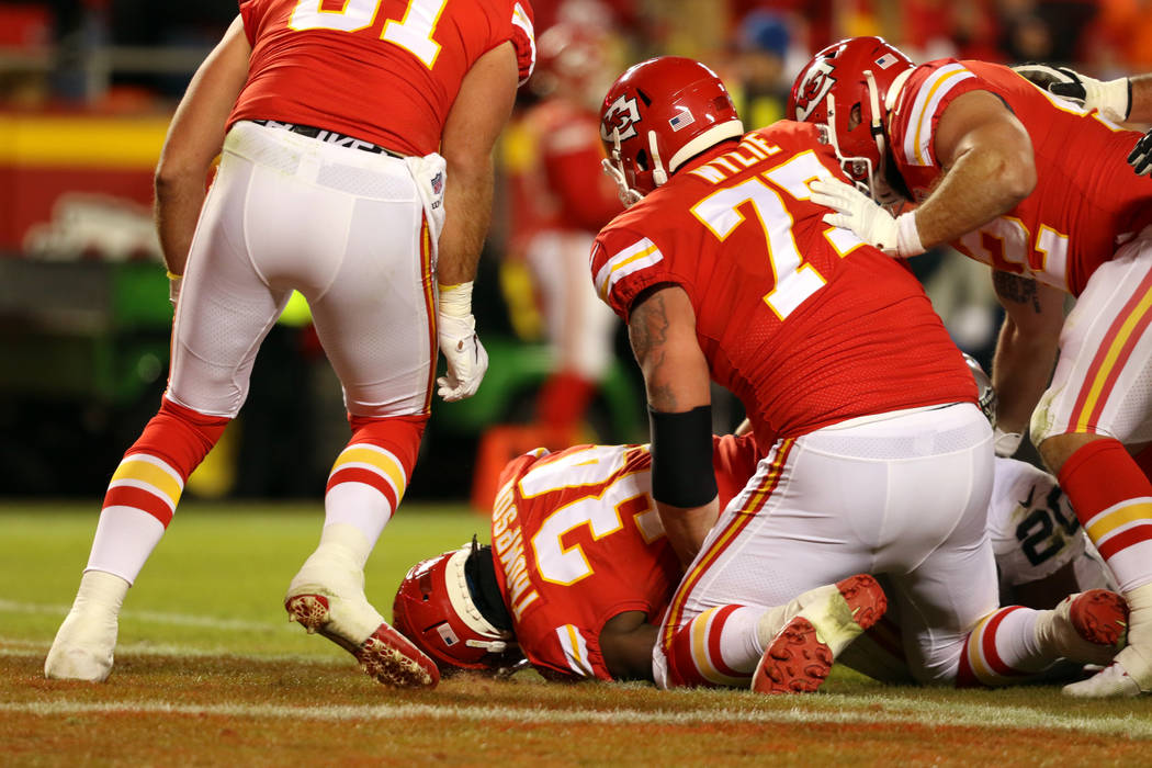 Kansas City Chiefs running back Darwin Thompson (34) scores a touchdown during the second half ...