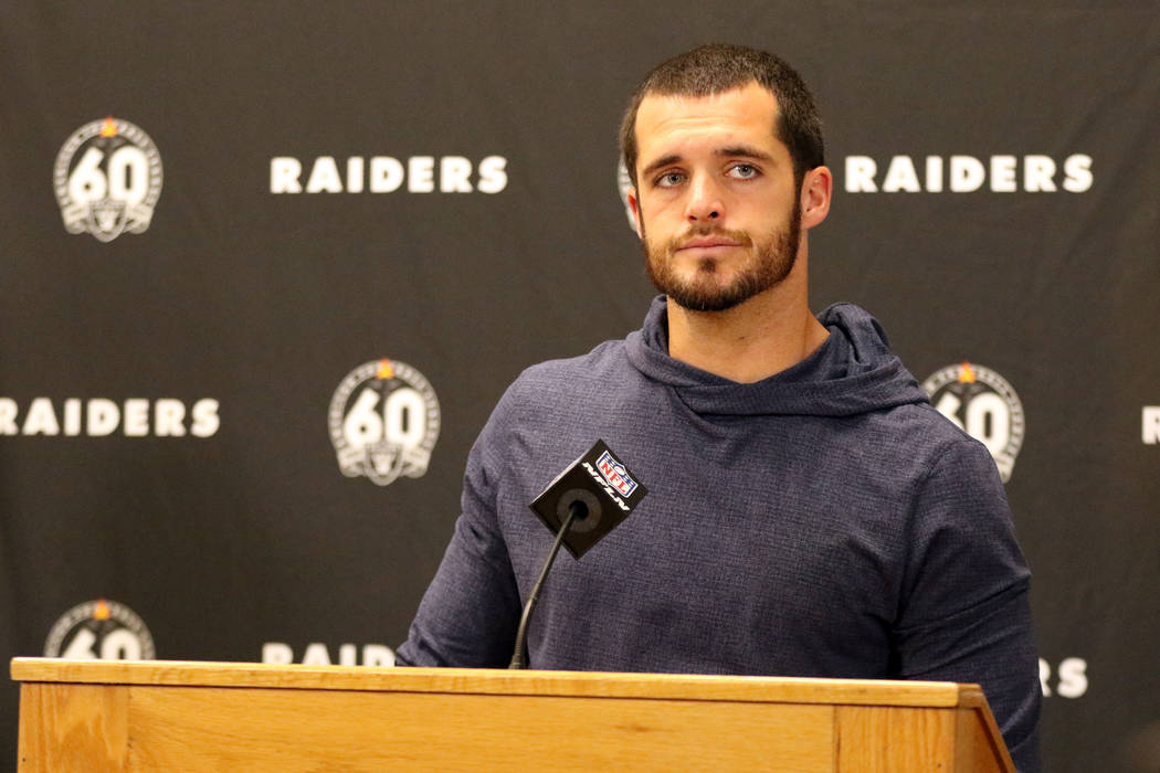 Oakland Raiders quarterback Derek Carr meets with the media after an NFL game against the Kansa ...