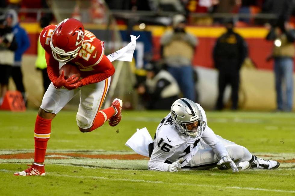 Kansas City Chiefs safety Juan Thornhill (22) intercepts a pass intended for Oakland Raiders wi ...