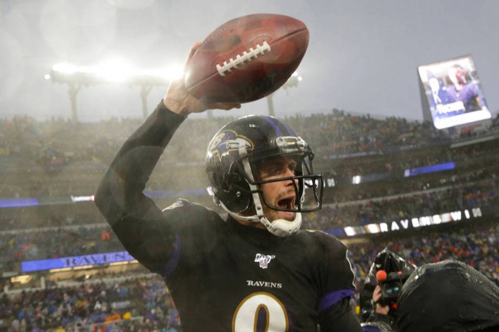 Baltimore Ravens kicker Justin Tucker (9) celebrates after making a game winning field goal aga ...