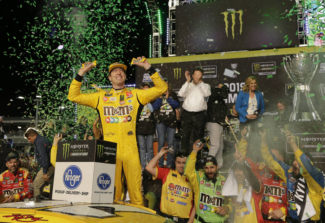 Kyle Busch celebrates in Victory Lane after winning the NASCAR Cup Series auto racing season ch ...