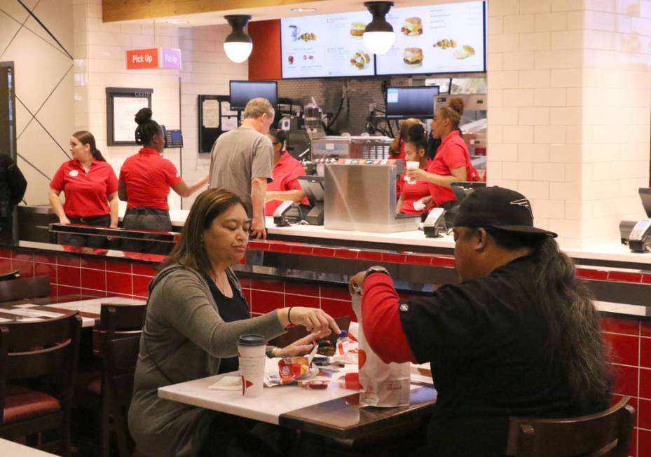 Customers enjoy their meal at the first Chick-fil-A restaurant inside the Golden Nugget on Mond ...