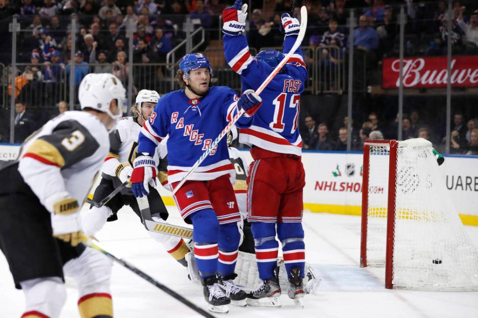 New York Rangers left wing Brendan Lemieux (48) and right wing Jesper Fast (17) celebrate Lemie ...