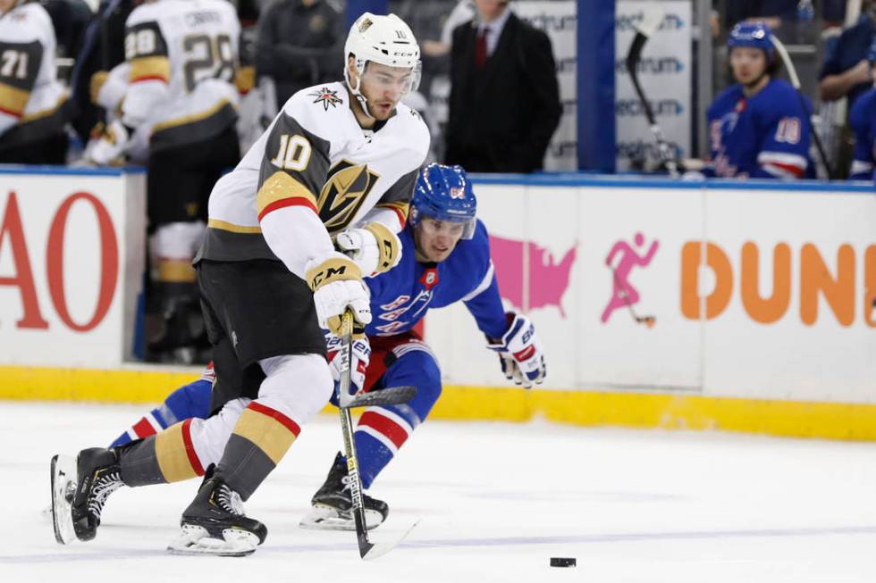 New York Rangers left wing Pavel Buchnevich (89) tries to keep up with Vegas Golden Knights cen ...