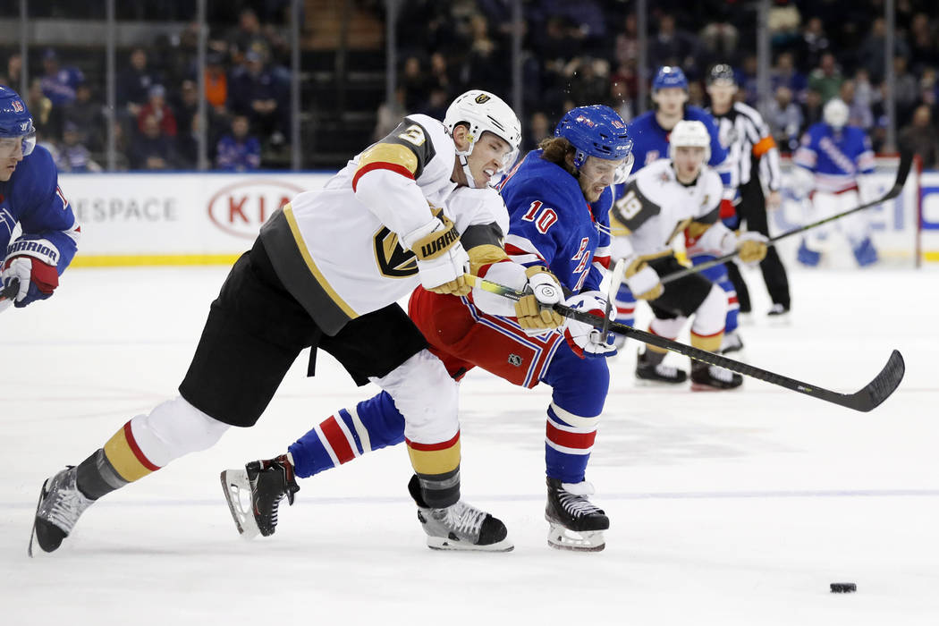 Vegas Golden Knights defenseman Brayden McNabb (3) and New York Rangers center Artemi Panarin ( ...