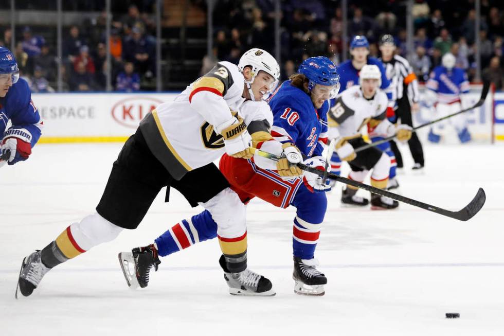 Vegas Golden Knights defenseman Brayden McNabb (3) and New York Rangers center Artemi Panarin ( ...