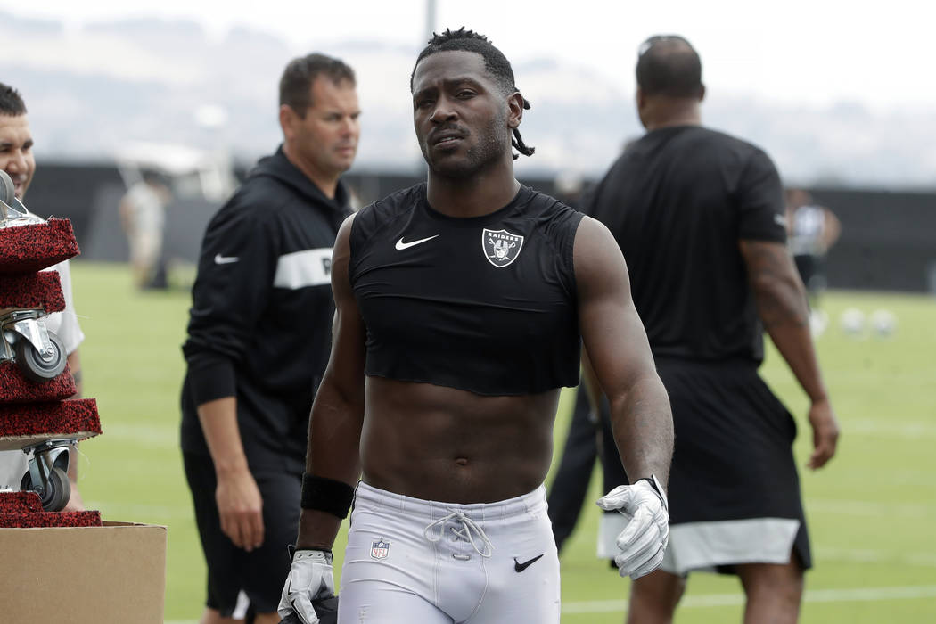 FILE - In this Aug. 20, 2019, file photo, Oakland Raiders' Antonio Brown walks off the field af ...