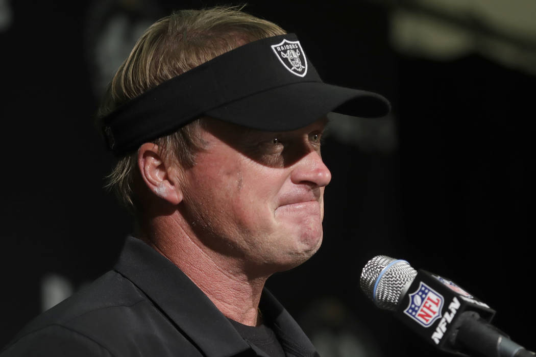 Oakland Raiders head coach Jon Gruden speaks at a news conference after an NFL football game ag ...