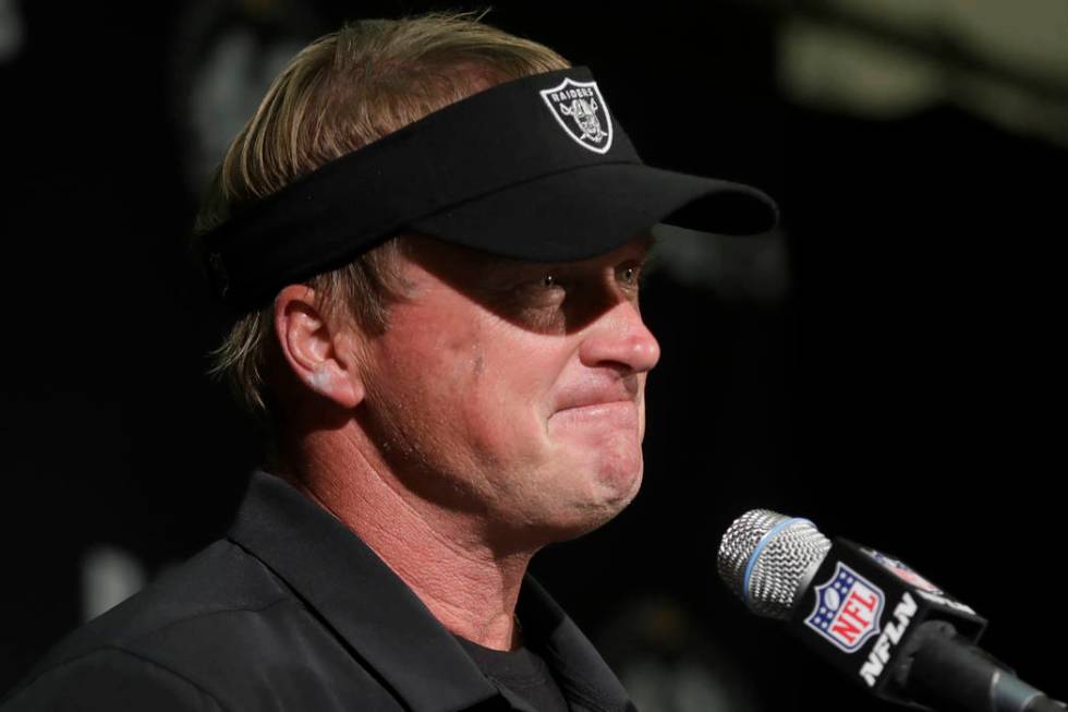 Oakland Raiders head coach Jon Gruden speaks at a news conference after an NFL football game ag ...