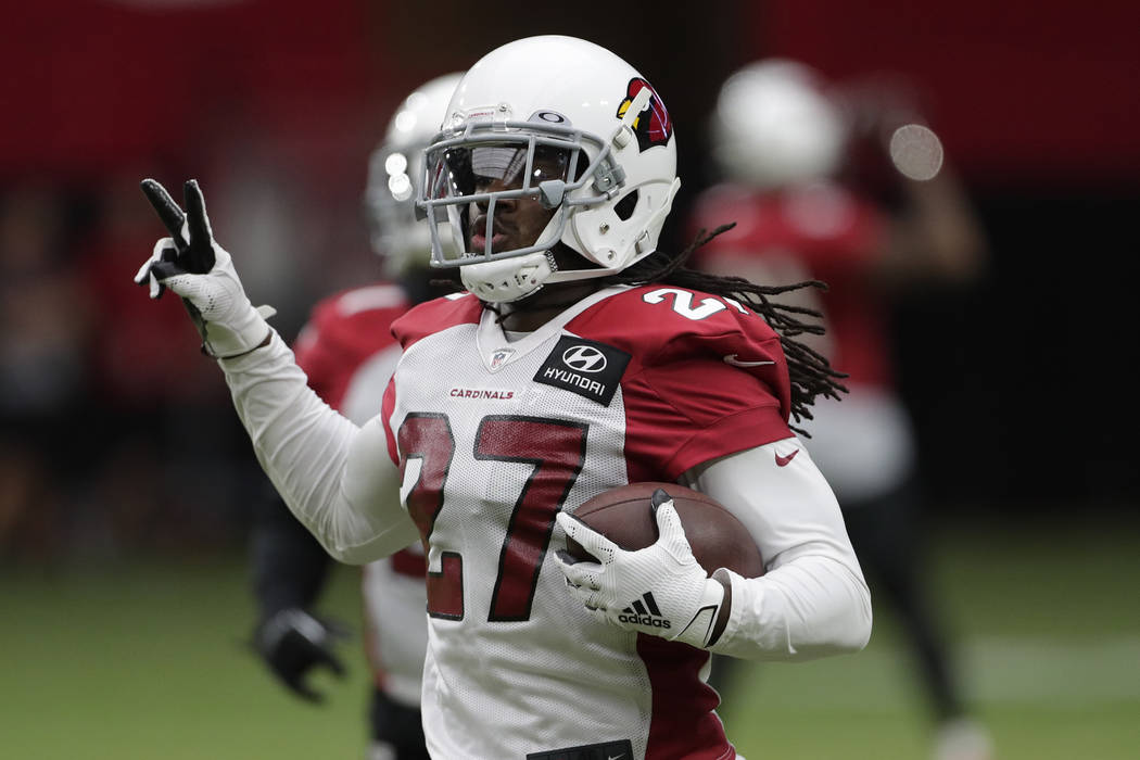 Arizona Cardinals' Josh Shaw runs drills during the teams' NFL football training camp in Glenda ...