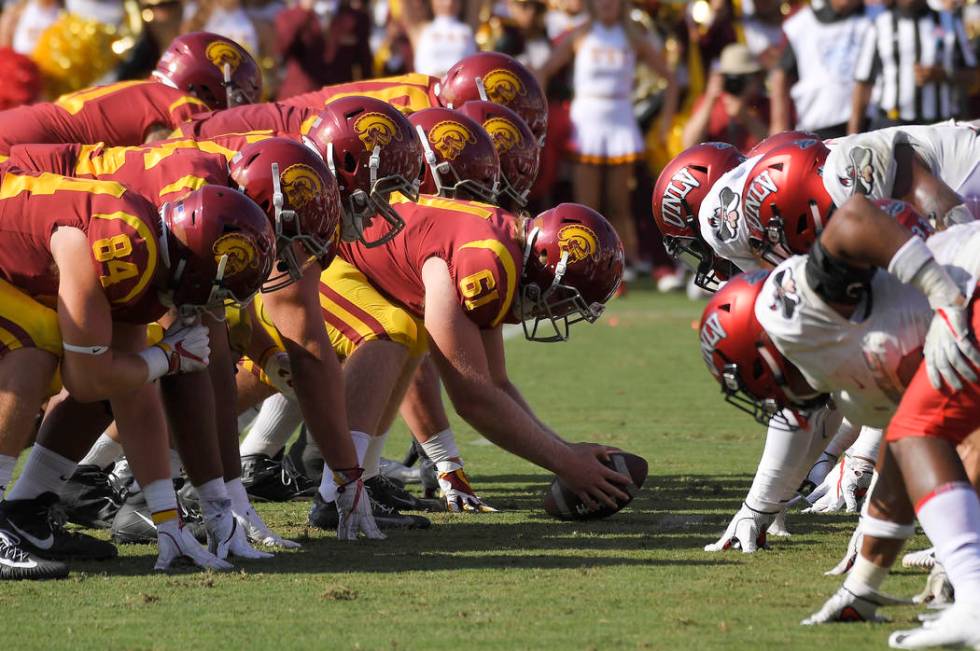 Southern California long snapper Jake Olson (61), who is blind, gets set for a point-attempt du ...