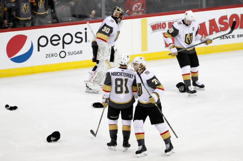 Vegas Golden Knights center William Karlsson (71) congratulates center Jonathan Marchessault (8 ...