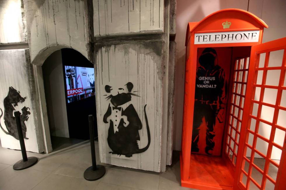 A selfie spot at the entrance to "Banksy: Genius or Vandal" at Immersion Vegas in Fas ...