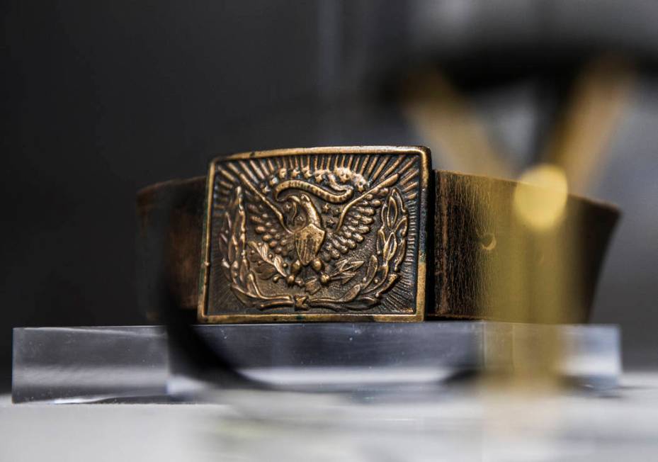 A custom leather belt with American bald eagle buckle worn on screen by film icon John Wayne at ...