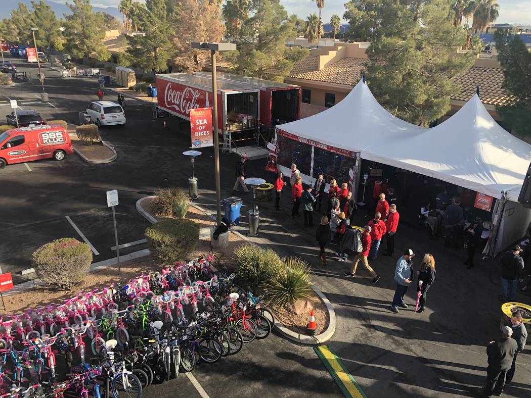 A look at the the 20th annual KLUC Toy Drive from Chet Buchanan's temporary home 30 feet above ...