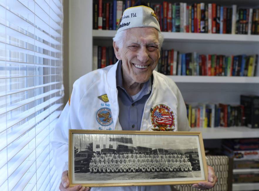 U.S. Army Air Corps veteran Edward Hall, a 95-year-old survivor of Pearl Harbor, poses for a ph ...