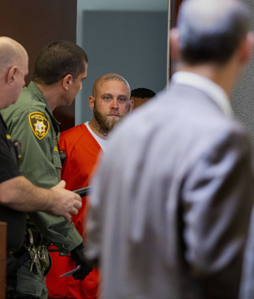 Bayzle Morgan enters the courtroom for a hearing at the Regional Justice Center in Las Vegas on ...