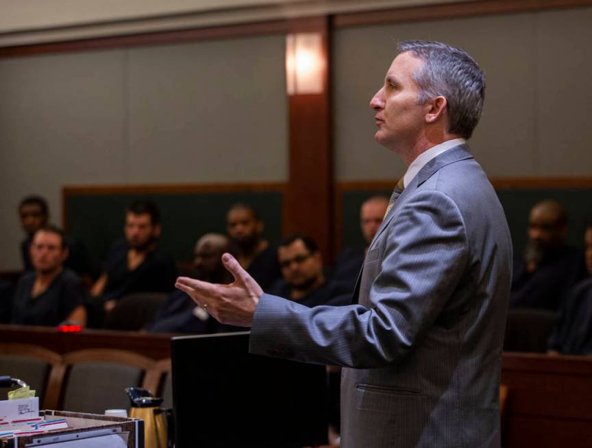 Prosecutor Giancarlo Pesci speaks to District Judge Michelle Leavitt during a hearing for Bayzl ...