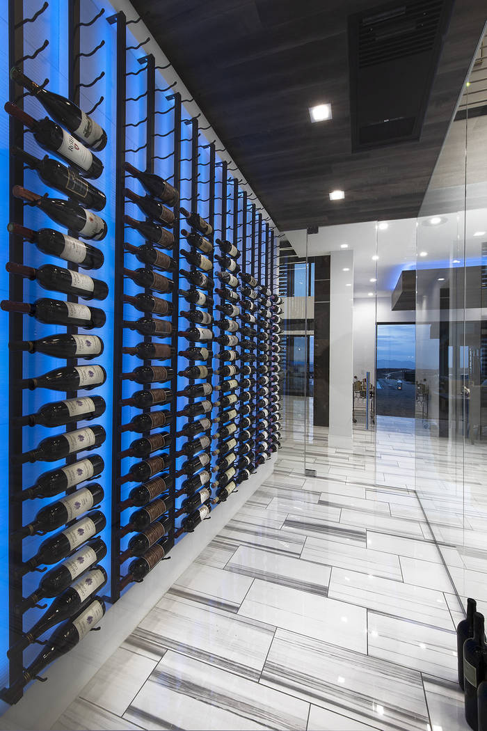 The home's wine wall is next to the dining room. (Synergy Sotheby’s International Realty)