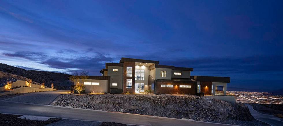 Las Vegas-based Edward Homes built this 8,600-square-foot home at 629 Dragon Peak Court. (Syner ...