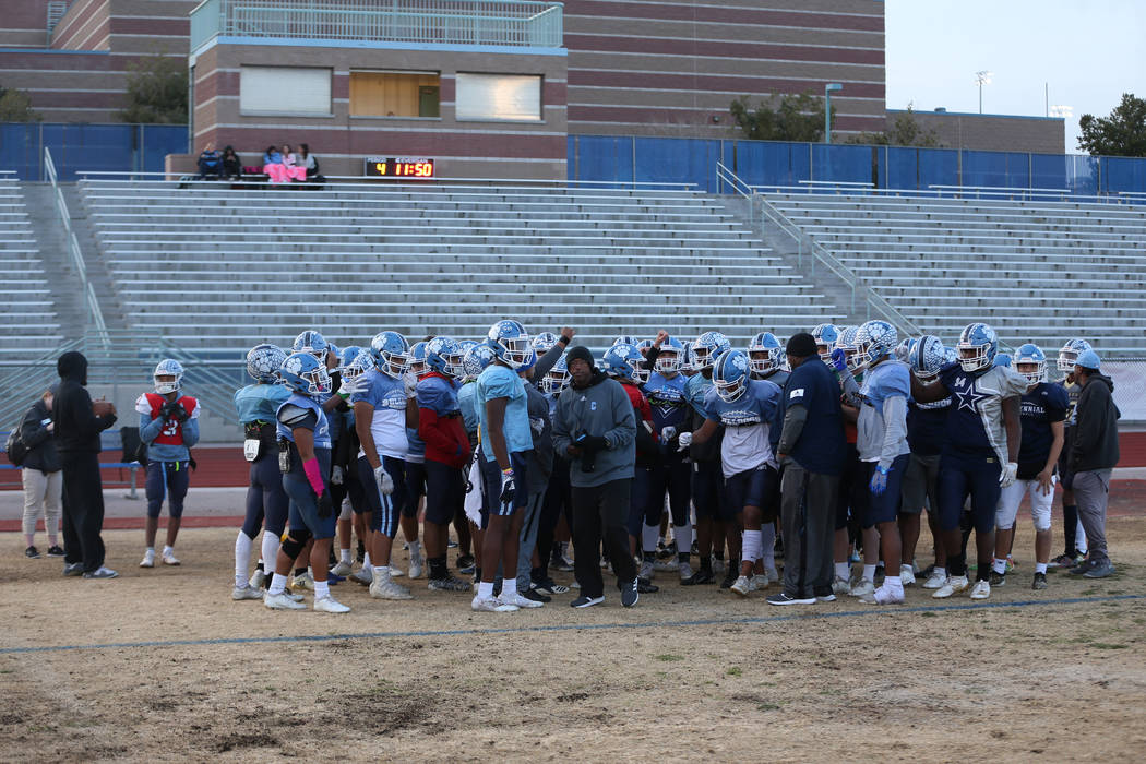 Centennial players huddle during a team practice at Centennial High School in Las Vegas, Thursd ...